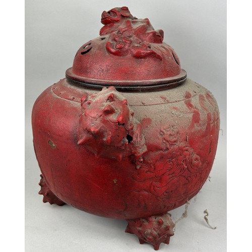 197A - A VERY LARGE CHINESE RED METAL INCENSE BURNER WITH FOO DOG LID, SHELL HANDLES AND FEET, 

Figure of ... 