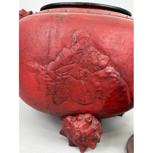 197A - A VERY LARGE CHINESE RED METAL INCENSE BURNER WITH FOO DOG LID, SHELL HANDLES AND FEET, 

Figure of ... 