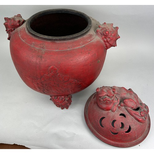 197A - A VERY LARGE CHINESE RED METAL INCENSE BURNER WITH FOO DOG LID, SHELL HANDLES AND FEET, 

Figure of ... 