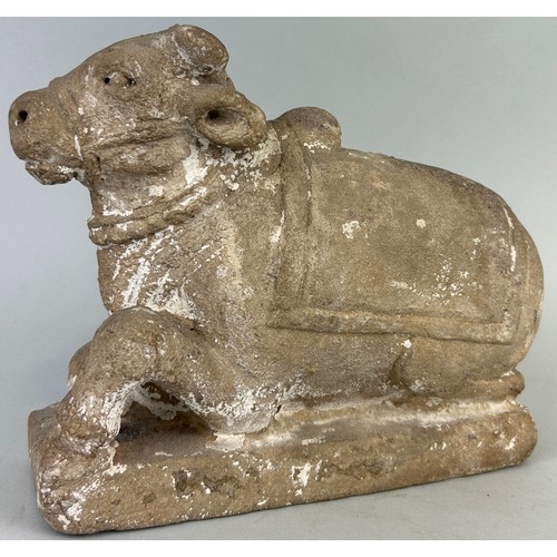 198 - A TIBETAN OR INDIAN STONE COW, 

23cm x 19cm