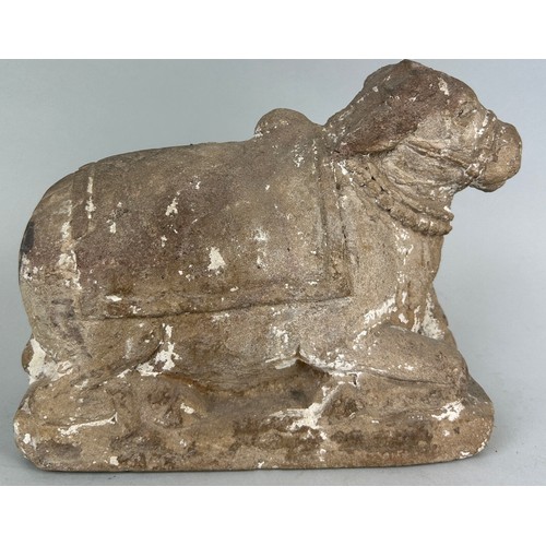 198 - A TIBETAN OR INDIAN STONE COW, 

23cm x 19cm