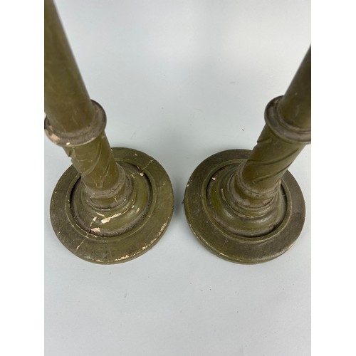 97 - A PAIR OF GREEN PAINTED WOODEN CANDLESTICKS