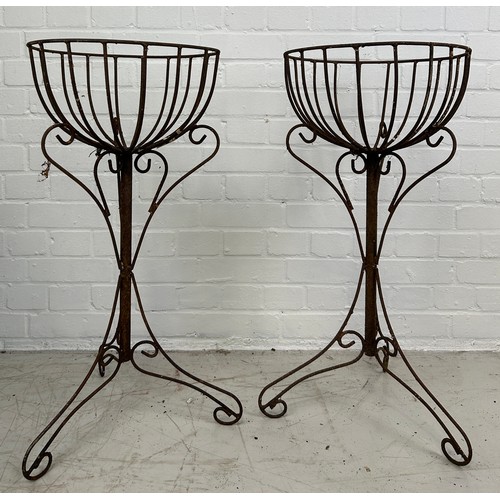 85 - A PAIR OF ANTIQUE WROUGHT IRON JARDINIERE STANDS ON TRIPOD SCROLL BASES, 

76cm x 42cm