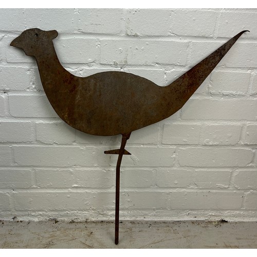 80 - A METAL WEATHER VANE TOP IN THE FORM OF A BIRD,

59cm x 57cm