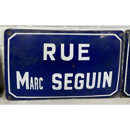 51 - A GROUP OF FOUR FRENCH BLUE ENAMEL STREET SIGNS, 

Largest 45cm x 25cm