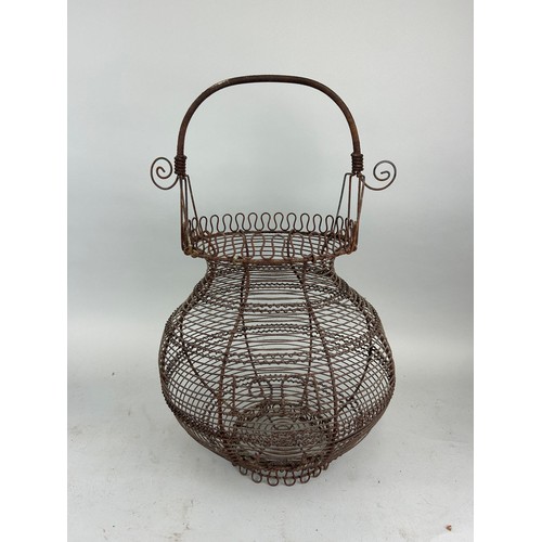 86 - A FRENCH WROUGHT IRON BASKET, 

57cm x 31cm