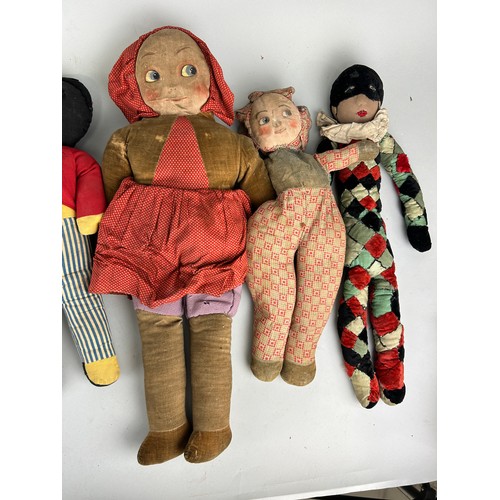 42 - A GROUP OF SIX ANTIQUE DOLLS TO INCLUDE A HARLEQUIN JESTER (6)

Largest 56cm L