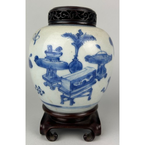 133 - A CHINESE KANGXI PERIOD BLUE AND WHITE JAR WITH ROSEWOOD COVER ON ROSEWOOD STAND, 

12cm H

With sta... 