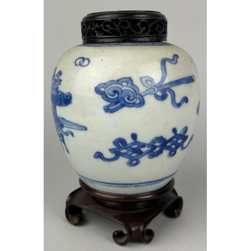 133 - A CHINESE KANGXI PERIOD BLUE AND WHITE JAR WITH ROSEWOOD COVER ON ROSEWOOD STAND, 

12cm H

With sta... 