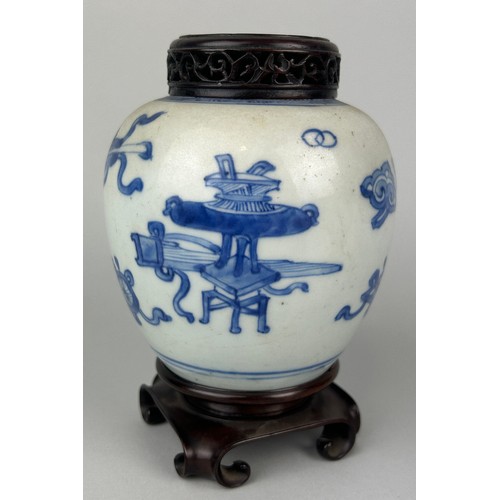 133 - A CHINESE KANGXI PERIOD BLUE AND WHITE JAR WITH ROSEWOOD COVER ON ROSEWOOD STAND, 

12cm H

With sta... 