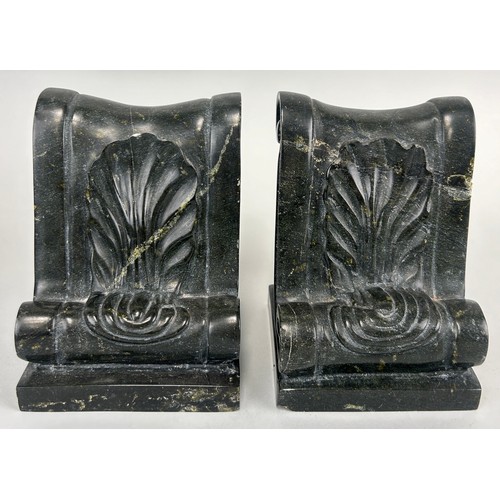 141 - A PAIR OF SERPENTINE MARBLE BOOKENDS WITH ACANTHUS LEAF SCROLLS,

14cm x 11cm x 10cm