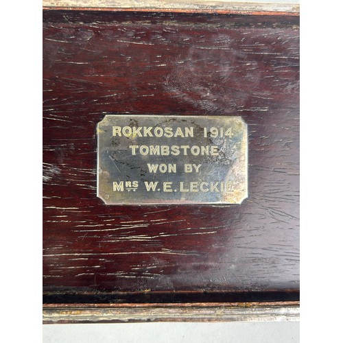 145 - AN ORIENTAL SILVER BOX DECORATED WITH FLOWERS, 

Inscribed inside 'Rokkosan 1914 Tombstone won by Mr... 