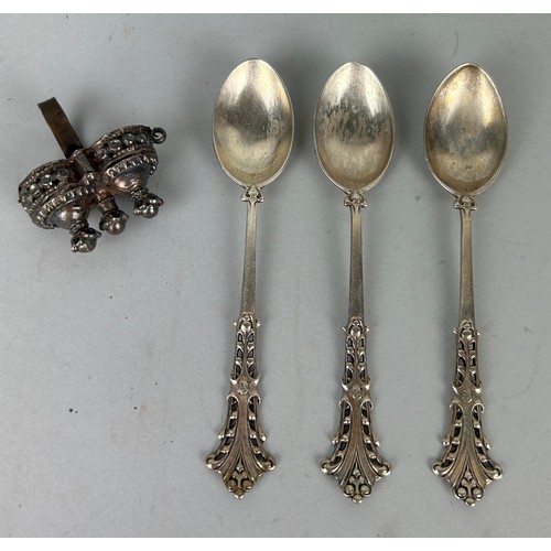 149 - THREE SILVER SPOONS ALONG WITH AN UNUSUAL SILVER RING RATTLE, 

Spoons marked 'GHB'

Total weight: 6... 