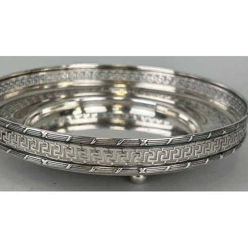 156 - A SILVER COASTER WITH PIERCED GREEK KEY BORDER, 

Weight 217gms