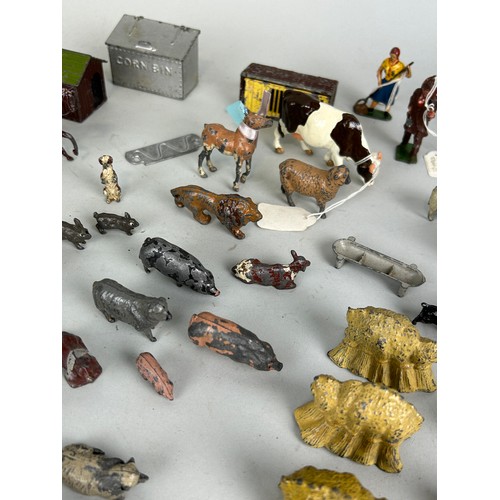 63 - A COLLECTION OF ANTIQUE DIE CAST FARMERS, FARM ANIMALS AND FARM EQUIPMENT (QTY)