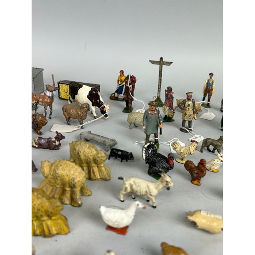 63 - A COLLECTION OF ANTIQUE DIE CAST FARMERS, FARM ANIMALS AND FARM EQUIPMENT (QTY)