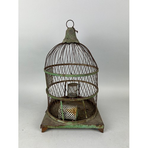 64 - AN ANTIQUE GREEN PAINTED BIRD CAGE, 

42cm x 24cm