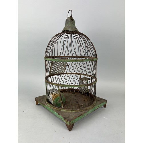 64 - AN ANTIQUE GREEN PAINTED BIRD CAGE, 

42cm x 24cm