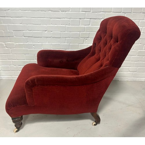 121 - A DEEP SEATED VICTORIAN ARMCHAIR UPHOLSTERED IN RED VELVET FABRIC,

90cm x 78cm x 64cm