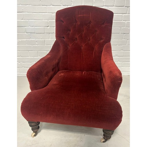 121 - A DEEP SEATED VICTORIAN ARMCHAIR UPHOLSTERED IN RED VELVET FABRIC,

90cm x 78cm x 64cm