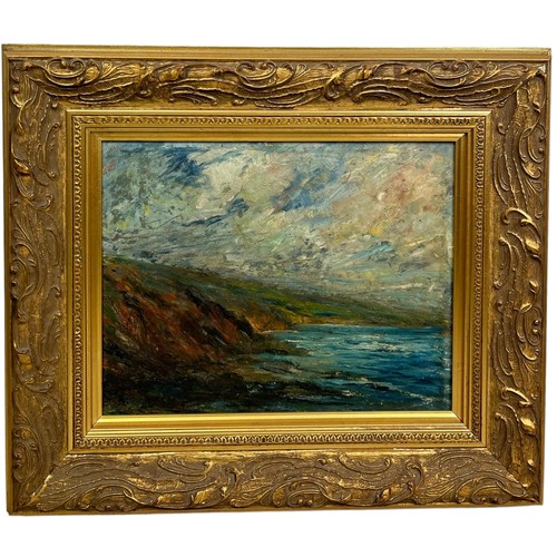 161 - AN OIL PAINTING ON CANVAS DEPICTING A COASTAL SCENE WITH CLIFFS, SEA AND SUNLIGHT BREAKING THROUGH T... 