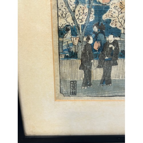 188 - A JAPANESE WOODBLOCK PRINT DEPICTING A CEREMONY, 

35cm x 22cm 

Mounted in frame and glazed.

46cm ... 