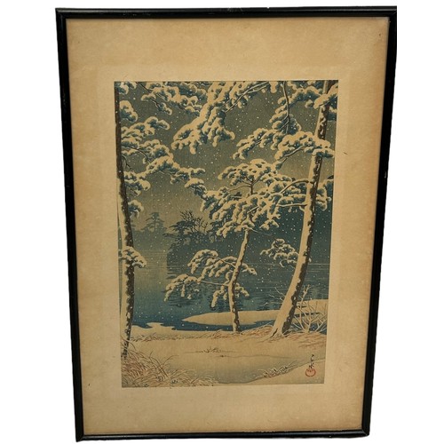 189 - A JAPANESE WOODBLOCK PRINT DEPICTING A WINTRY LANDSCAPE MARKED FOR KAWASE HASUI (1883-1957).

36cm x... 