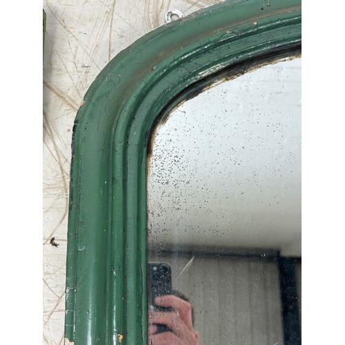 84A - TWO ANTIQUE GREEN PAINTED MIRRORS, 

Largest 112cm x 65cm