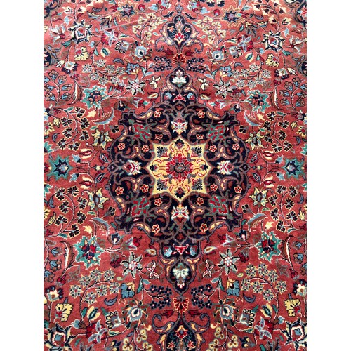 890 - A PERSIAN DESIGN CARPET, 

190cm x 113cm