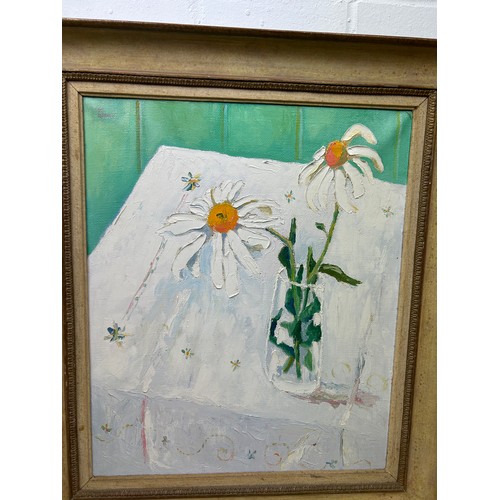 4 - JOHN PAWLE (1915-2010): AN OIL PAINTING ON CANVAS DEPICTING DAISY FLOWERS IN A GLASS VASE ON A TABLE... 