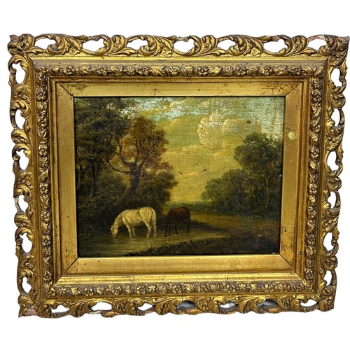 13 - A VICTORIAN OIL PAINTING ON CANVAS DEPICTING TWO HORSES DRINKING AT A POOL OF WATER BESIDES A FOREST... 