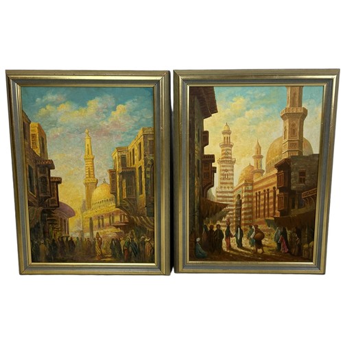 66 - AFTER DAVID ROBERTS RA: PAIR OF ARABIC OIL PAINTINGS ON CANVAS,

67cm x 47cm 

Mounted in frames

80... 