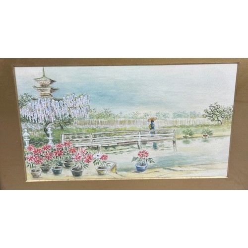 94 - A PAIR OF ORIENTALIST WATERCOLOUR DRAWINGS ON PAPER DEPICTING A FIGURE HOLDING A PARASOL ON A BRIDGE... 