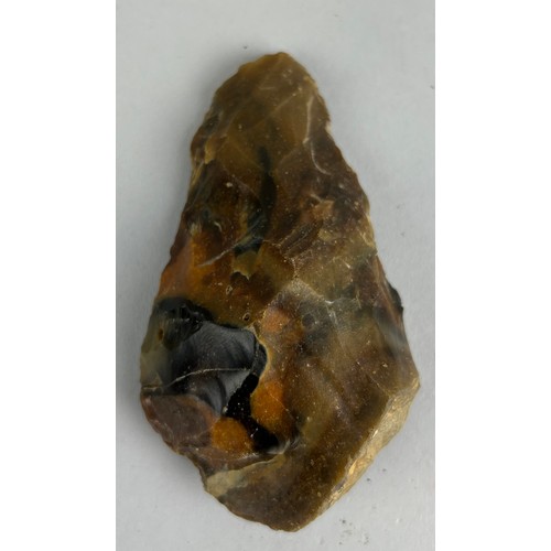 147 - A PALAEOLITHIC FLINT HAND AXE,

10cm L

Very finely formed, from Reculver, Kent 
Old British collect... 