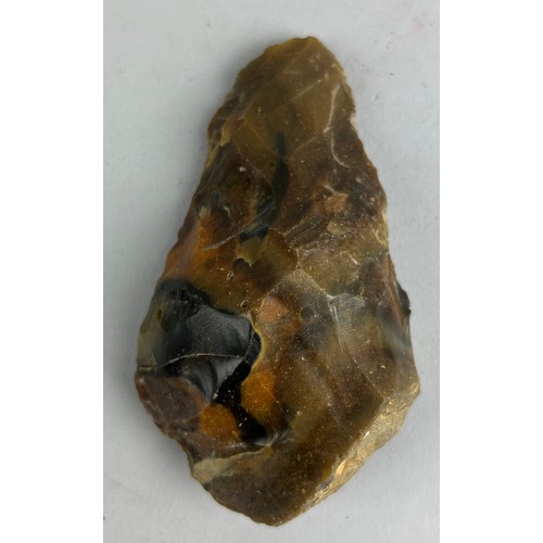 147 - A PALAEOLITHIC FLINT HAND AXE,

10cm L

Very finely formed, from Reculver, Kent 
Old British collect... 