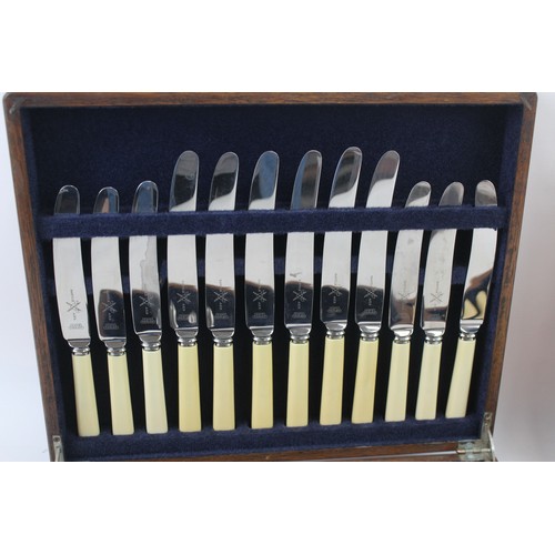 873 - A VINTAGE CUTLERY SET BATTLE AXE 45/24 FISH WOODEN CANTEEN (2),