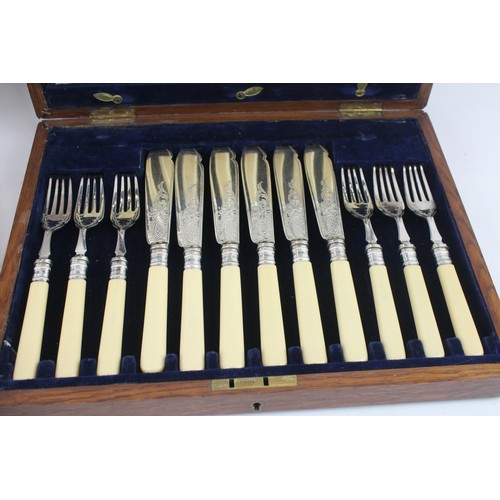 873 - A VINTAGE CUTLERY SET BATTLE AXE 45/24 FISH WOODEN CANTEEN (2),