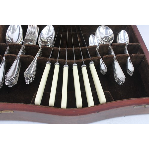 872 - A VINTAGE CUTLERY SET COMMUNITY STAINLESS STEEL SHEFFIELD T2 PIECE WOODEN CANTEEN,