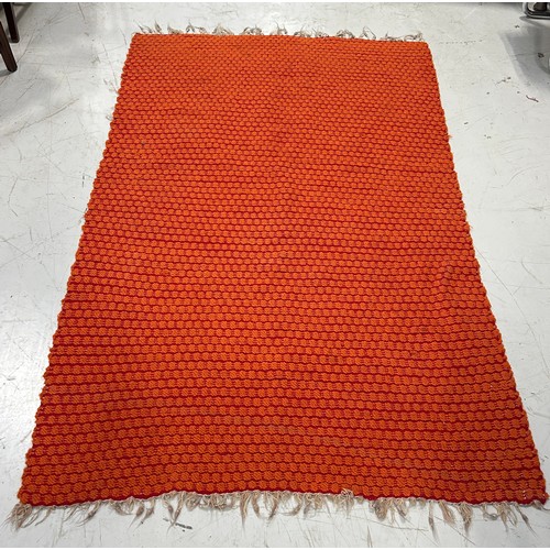 895 - AN ORANGE AND RED WEAVE WELSH BLANKET BLANKET, 

200cm x 130cm