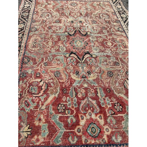 881 - A PERSIAN DESIGN CARPET,
 
200cm x 125cm