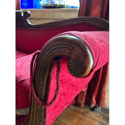 7 - A REGENCY MAHOGANY SOFA UPHOLSTERED IN DISTRESSED RED FLORAL FABRIC WITH TWO CUSHIONS, 

200cm x 80c... 