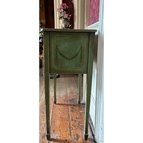 11 - A SHERATON STYLE GREEN PAINTED SIDE TABLE RAISED ON FOUR TAPERING LEGS, 

Painted with swags of laur... 