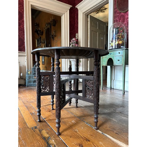 52 - A MOROCCAN BENARES TABLE WITH ENAMELLED TRAY, 

58cm x 53cm