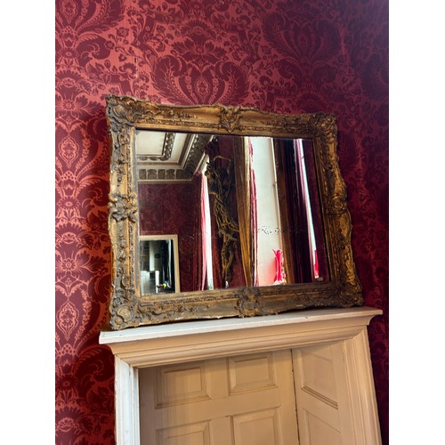 69 - A 19TH CENTURY GILT WOOD WALL MIRROR, 

100cm x 85cm