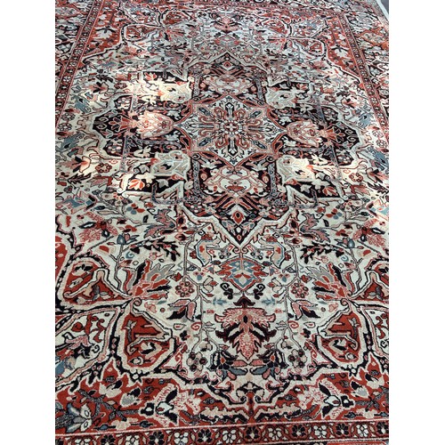 77 - A LARGE WOOL CARPET