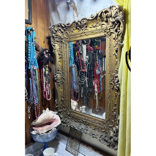 95 - A 19TH CENTURY GILT WOOD WALL MIRROR,

77cm x 56cm