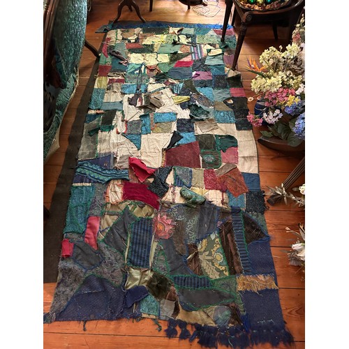 105 - AN 'ANN BROADBENT' EMBROIDERED VELVET QUILT,