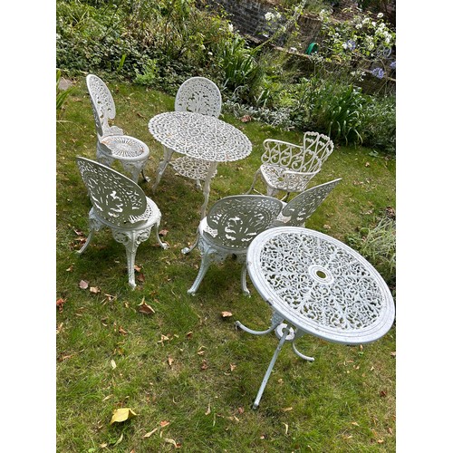 109 - A CIRCULAR GARDEN TABLE WITH VARIOUS ALUMNIUM CHAIRS MANY IN THE COALBROOKDALE STYLE,  

Each chair ... 