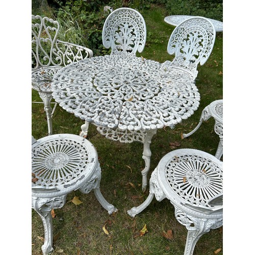 109 - A CIRCULAR GARDEN TABLE WITH VARIOUS ALUMNIUM CHAIRS MANY IN THE COALBROOKDALE STYLE,  

Each chair ... 