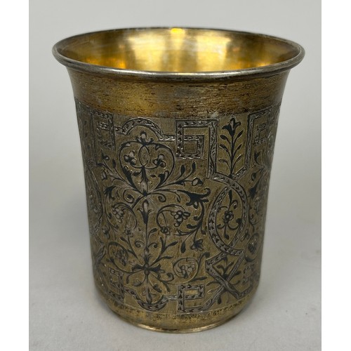 135 - A RUSSIAN NIELO SILVER BEAKER WITH SILVER GILT INTERIOR,

Marked 84 to verso. 

Weight: 112gms 

8cm... 